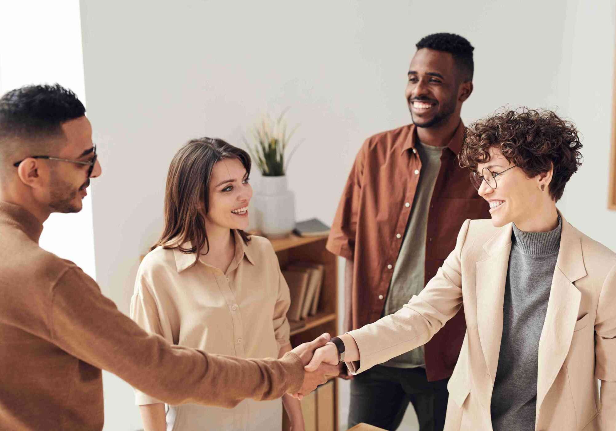 office workers shaking hands